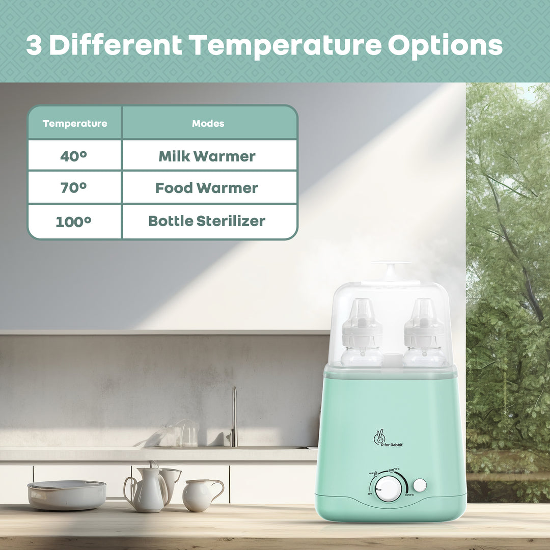 Green baby bottle warmer with temperature options on a kitchen counter