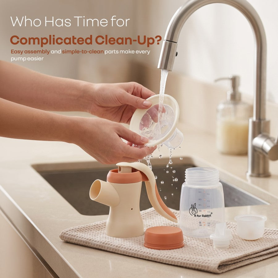 First Feed Comfy Manual Breast Pump with 106° Wide Angle Shield, 2 Adjustable Suction Modes & Anti Back Flow Design BPA Free - Apricot Orange