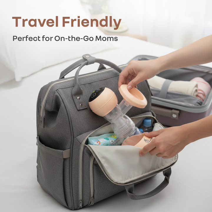 Gray travel bag with baby care items and text 'Travel Friendly, Perfect for On-the-Go Moms' on a light background.