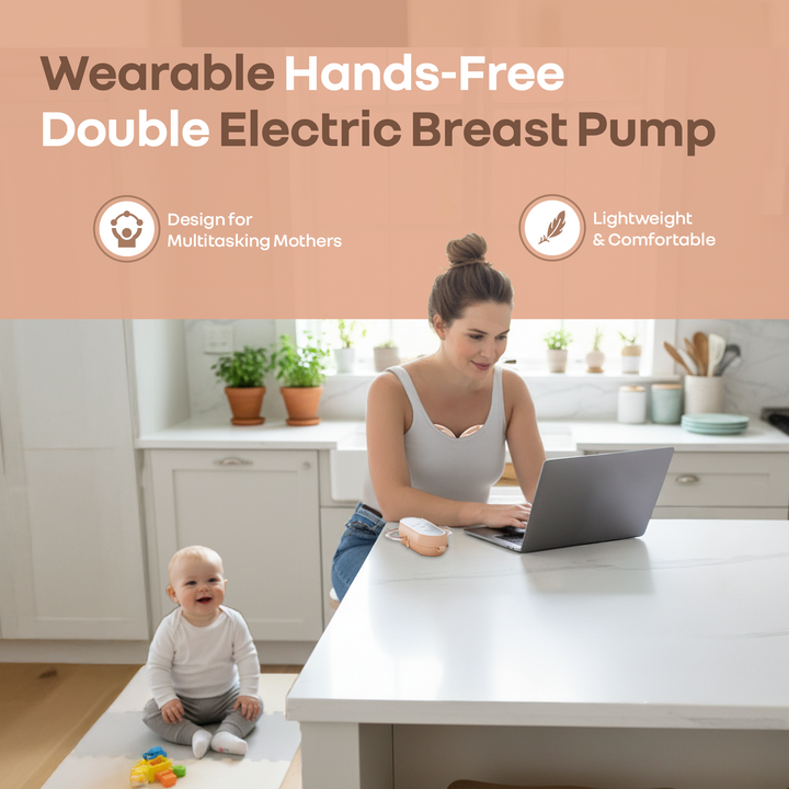 Woman using a laptop with a baby on the floor, promoting a wearable hands-free double electric breast pump.