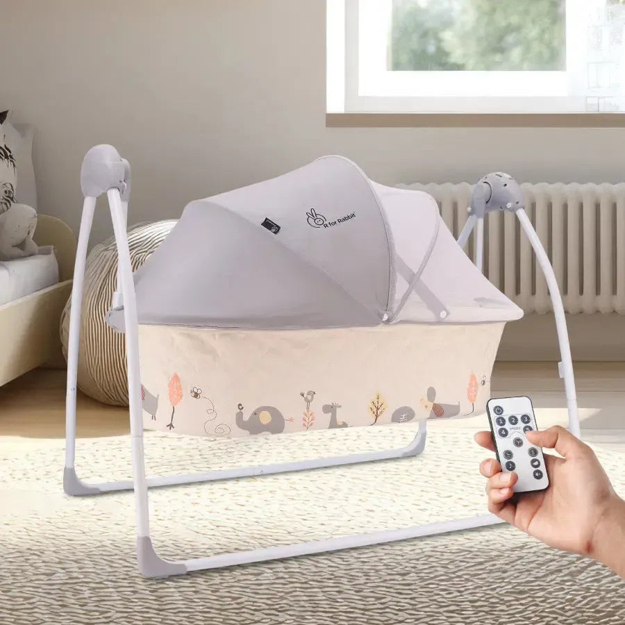 Lullabies Cradle - Auto Swing With Remote Control, 16 In-Built Soothing Music Tunes, Mosquito Net Baby Cradle, 3-Point Safety, Swing Lock - Cream